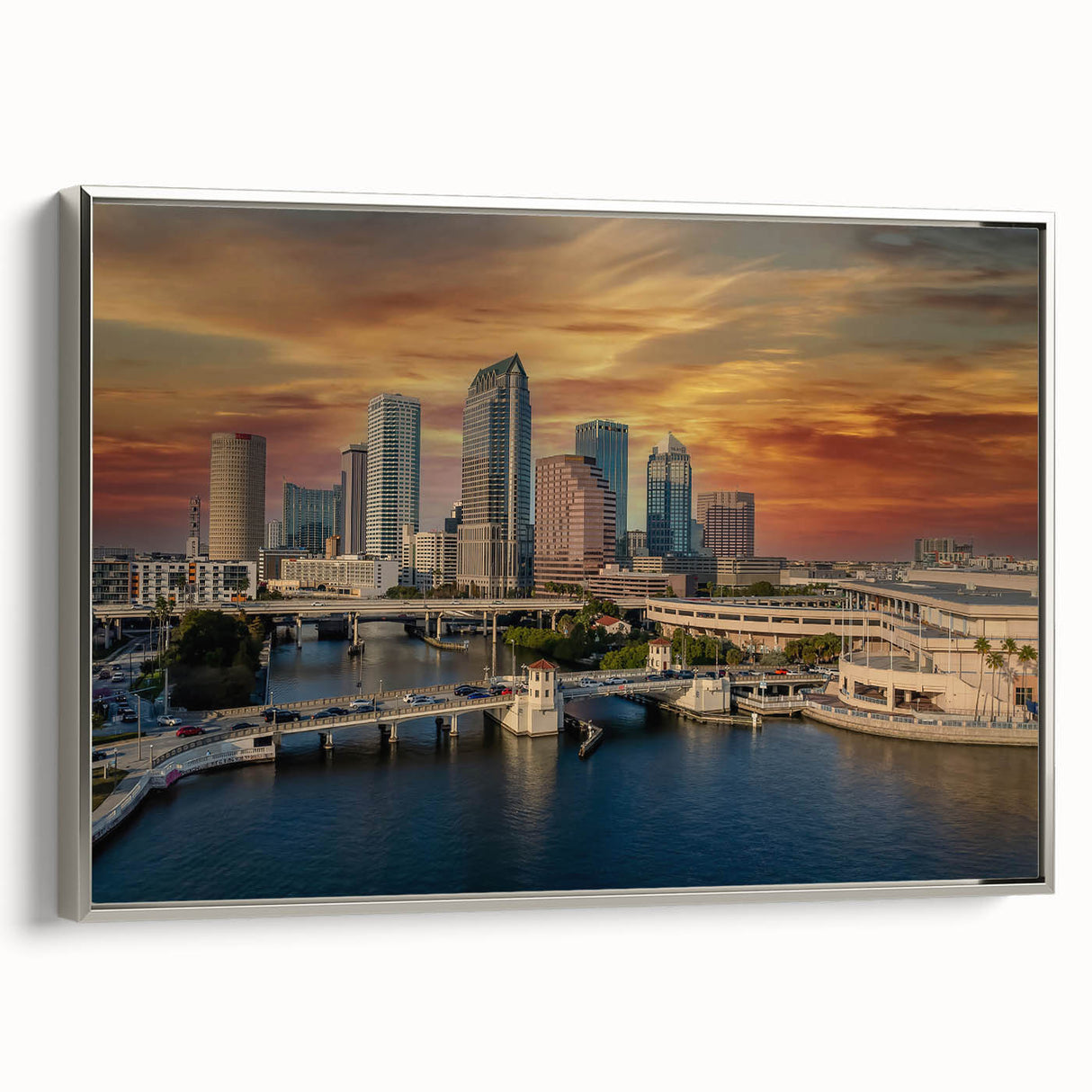 Landscape art painting of Tampa skyline in colorful hues on a silver-framed canvas, ideal for office decor.