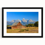 Abstract art print of colorful, textured scenery in Idaho on a large canvas, framed in black, ideal for living room decor.