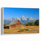 Vintage poster art of Idaho scenery on a framed canvas with vibrant colors, ideal for living room decor.