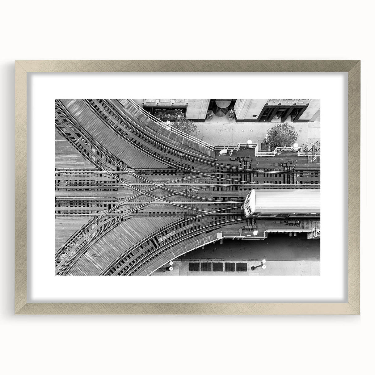 Textured abstract art print of Chicago skyline in muted gray and silver, framed with a mat, ideal for bedroom wall decor.