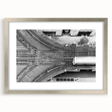 Textured abstract art print of Chicago skyline in muted gray and silver, framed with a mat, ideal for bedroom wall decor.