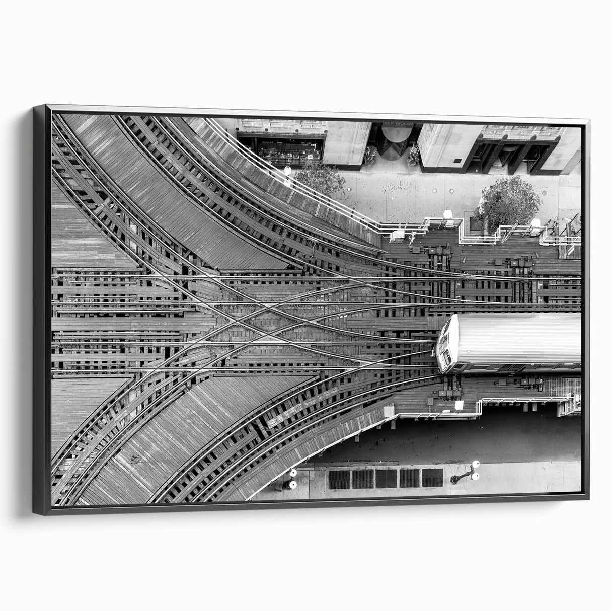 Black and white framed canvas of Chicago skyline, featuring vintage poster art style, ideal for bedroom wall decor.