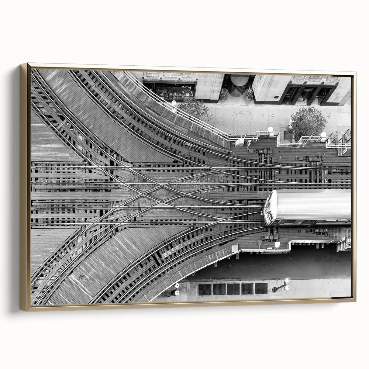 Framed canvas featuring a vintage-style landscape painting of the Chicago skyline in black and gold tones.
