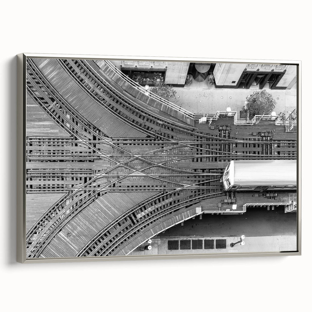 Framed canvas of a vintage Chicago skyline in muted black and colorful tones, ideal for office wall decor.
