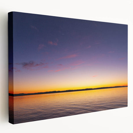 A panoramic view of Lake Michigan with a city skyline, rendered on a large stretched canvas, suited for kitchen wall art.