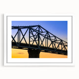 Abstract art print of Indiana scenery in muted earth tones on a framed white mat, ideal for dining room decor.