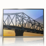 Mid-century modernist art depicting an Indiana landscape in muted browns and greens on a silver-framed acrylic.