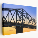 Large art depicting a serene Indiana landscape in muted green and blue tones on stretched canvas.