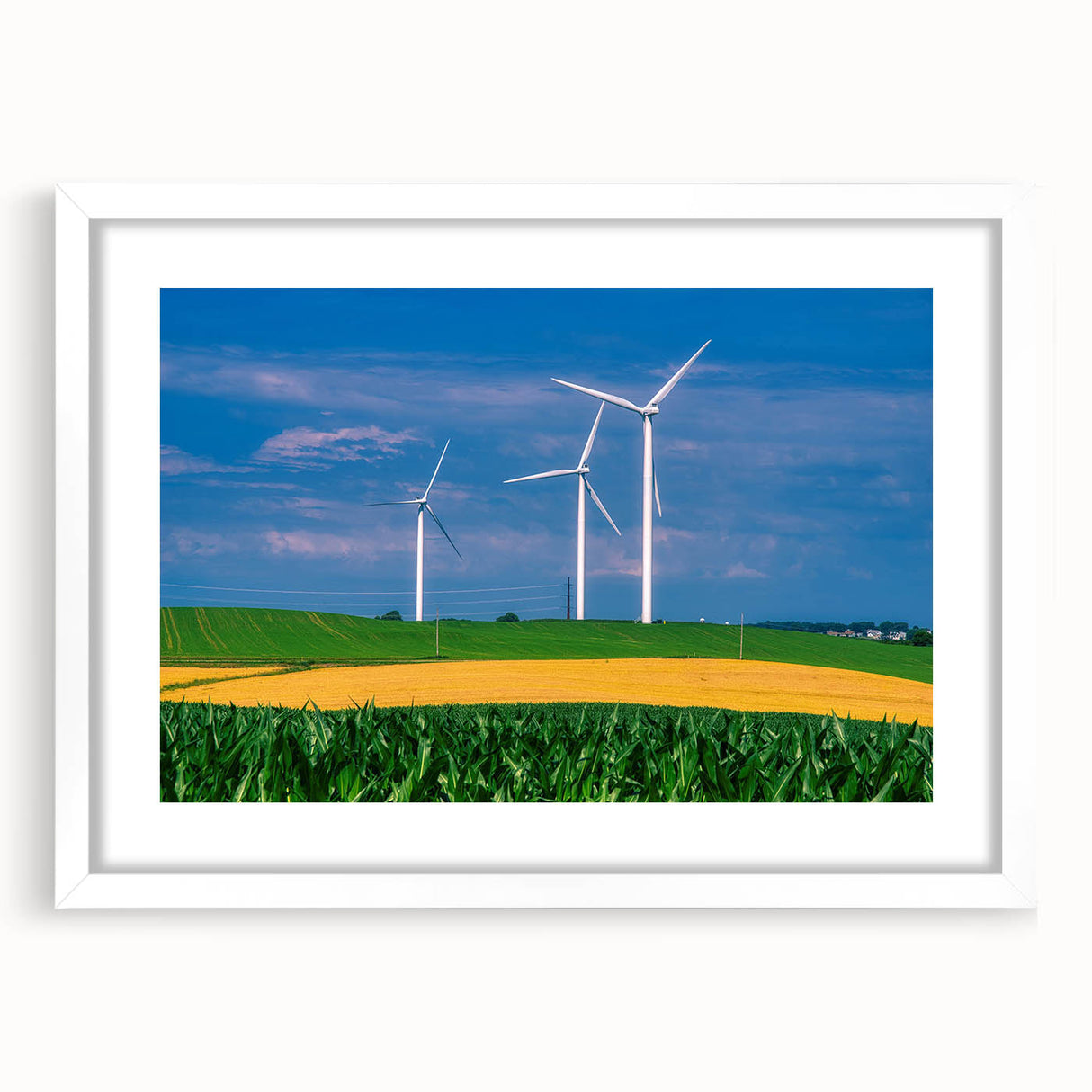 Abstract art print of Iowa scenery in muted earth tones on a framed white mat, suitable for bedroom or dining room decor.