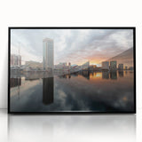 Large abstract wall art depicting Baltimore's skyline in muted grays and blues on a framed acrylic.