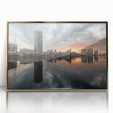 Framed acrylic print of Baltimore skyline in muted gold and blue tones, suitable as modern art wall decor.