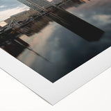 Art deco poster of Baltimore skyline in muted gold and navy hues on rolled canvas, suitable for dining room wall art.