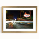 Extra large abstract art print of Las Vegas skyline in gold frame, featuring textured details and vibrant colors.