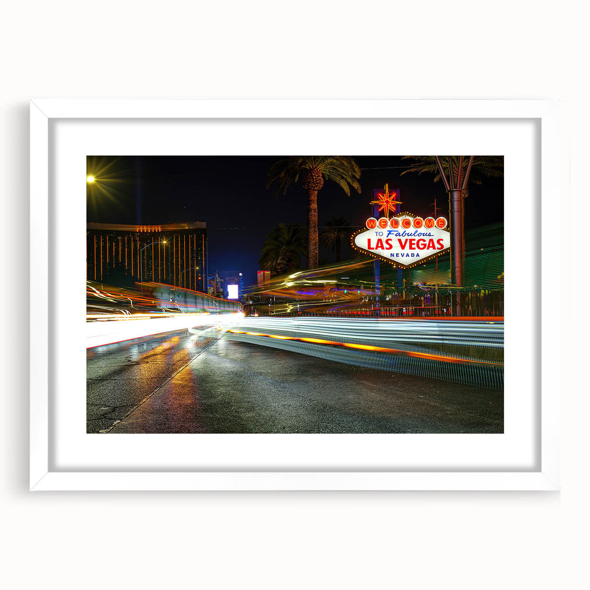 Abstract art print of Las Vegas skyline in muted gray and blue tones, framed with a white mat.