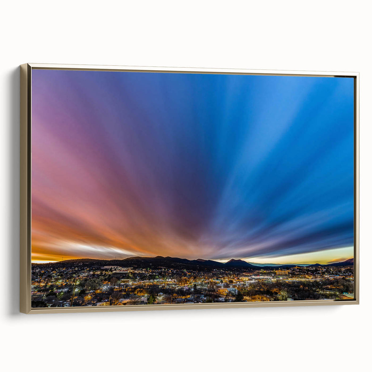 Framed canvas of a New Mexico landscape in gold and black, ideal for bedroom wall art.