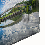 Large abstract wall art depicting the Charlotte skyline in muted blue and gray tones on acrylic glass.