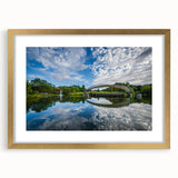 Abstract art print of Charlotte skyline in textured gold frame, ideal for extra large wall art in a living room.