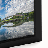 Extra large framed canvas depicting a textured, colorful skyline of Charlotte, North Carolina, ideal for living room decor.