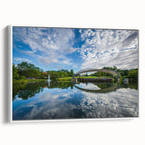 Vintage poster art of Charlotte skyline in vibrant colors on a large framed canvas, suitable for living room decor.