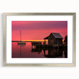 Textured abstract art print of Outer Banks scenery in muted earth tones, framed in silver, ideal for bedroom art.