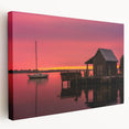 A stretched canvas depicting the serene Outer Banks in North Carolina with soft blue and light beige tones.