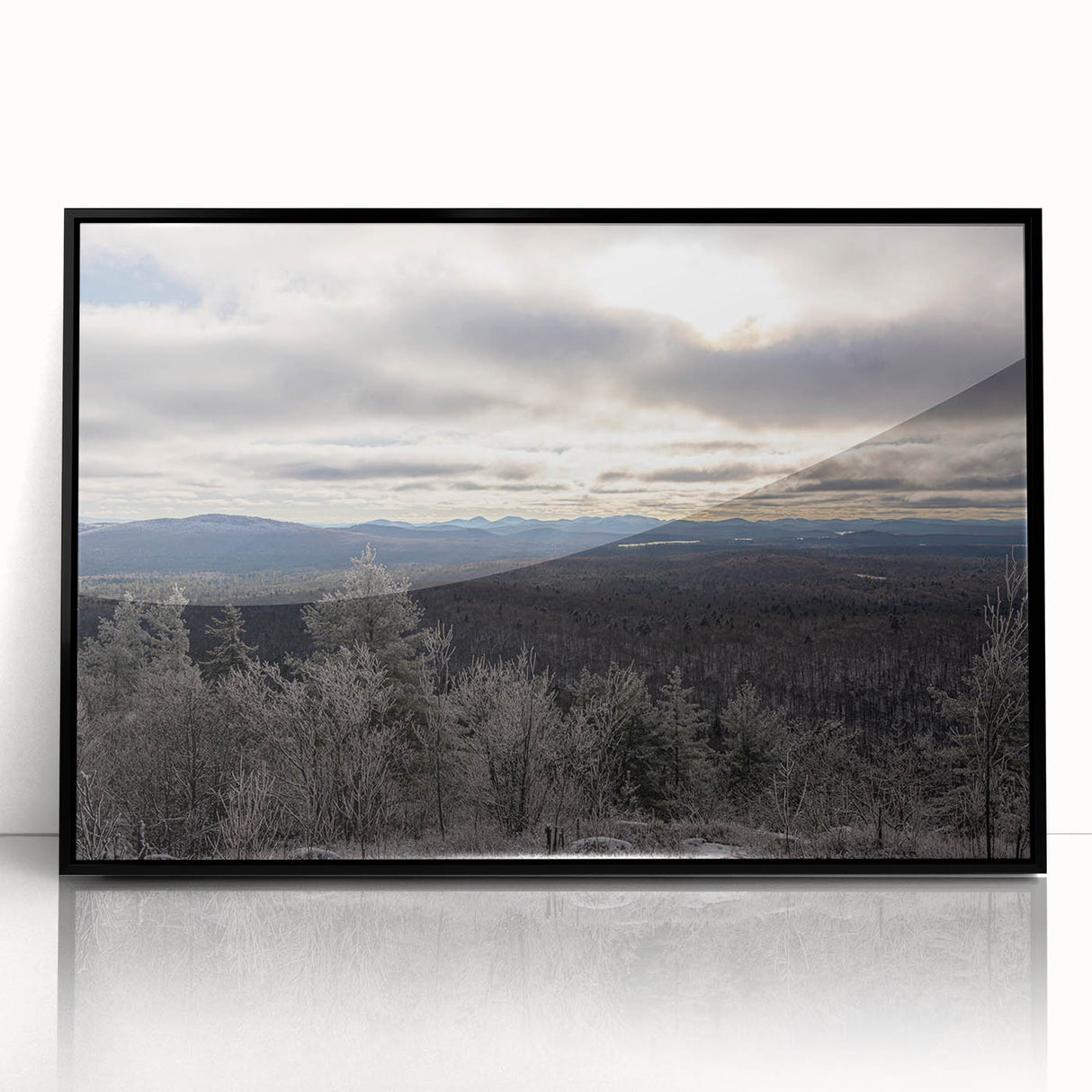 Large abstract wall art depicting the Adirondacks in muted earth tones, framed in black acrylic.