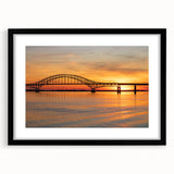 Abstract art print of colorful, textured scenery, framed in black, ideal for large living room walls.