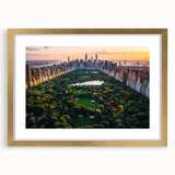 Extra large abstract art print of Central Park in muted green and brown tones, framed in gold, ideal for living room decor.