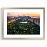 Textured art print of an abstract Central Park scene, using muted greens and browns, framed in silver.