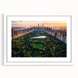 Abstract art print of Central Park with vibrant green and blue tones on a white framed poster.