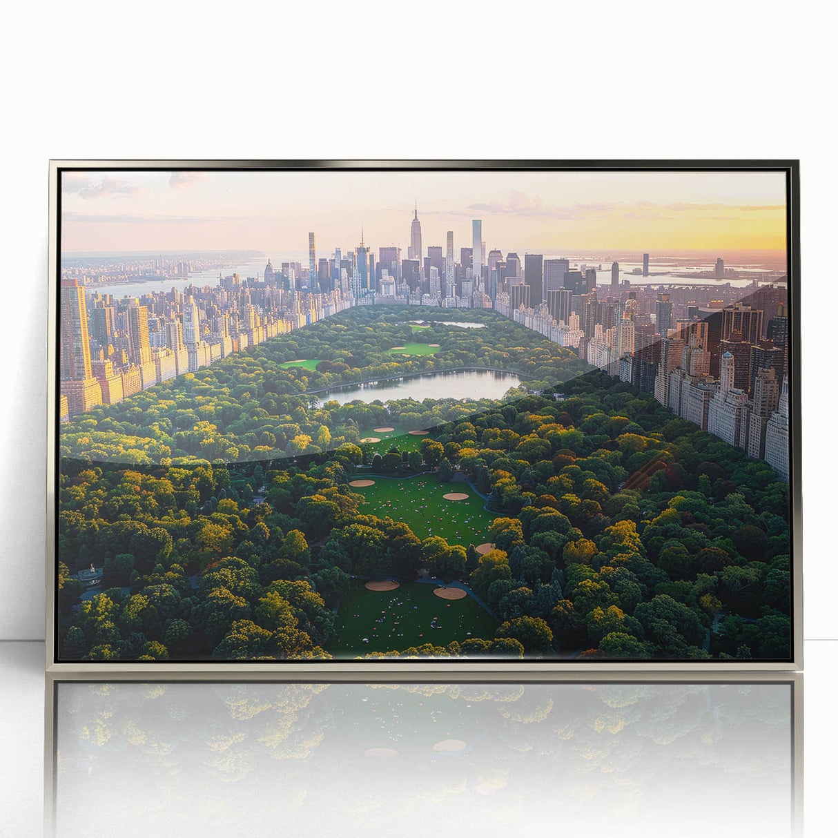 Mid-century modernist art depicting Central Park in muted green and brown tones, presented in a silver-framed acrylic print.