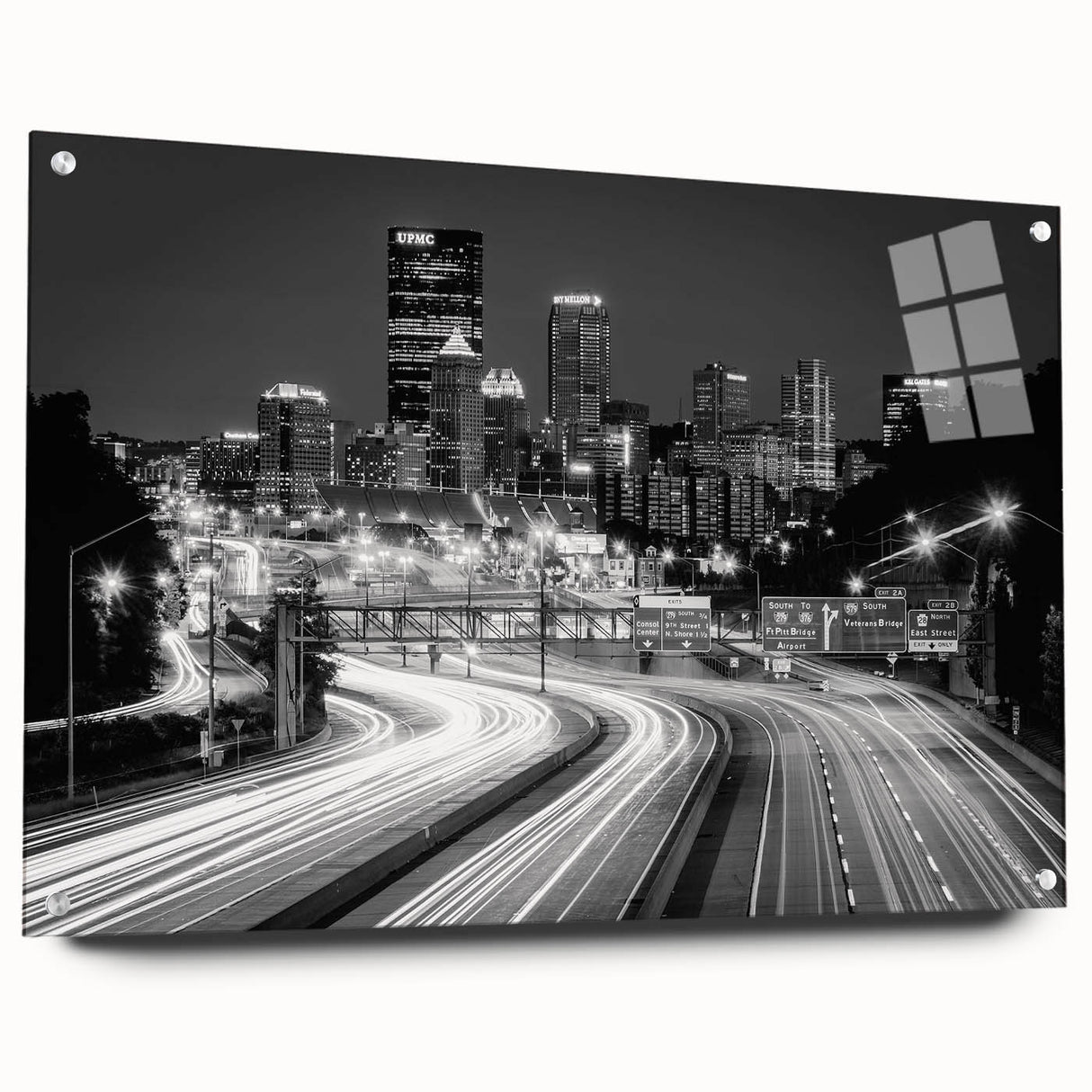 Acrylic print of Pittsburgh skyline in muted blue and gray tones, suitable for dining room decor.