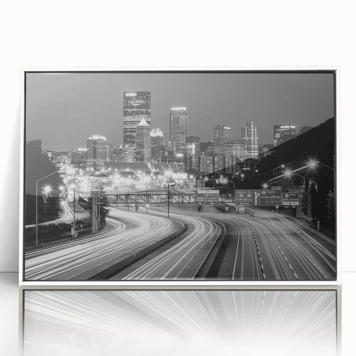 Art deco poster of Pittsburgh skyline in muted gray, framed acrylic, ideal for modern art wall decor in a nursery.