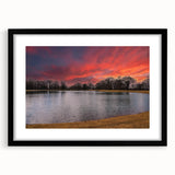 Abstract art print of Memphis scene in vibrant colors on a large framed canvas, suitable for living room decor.