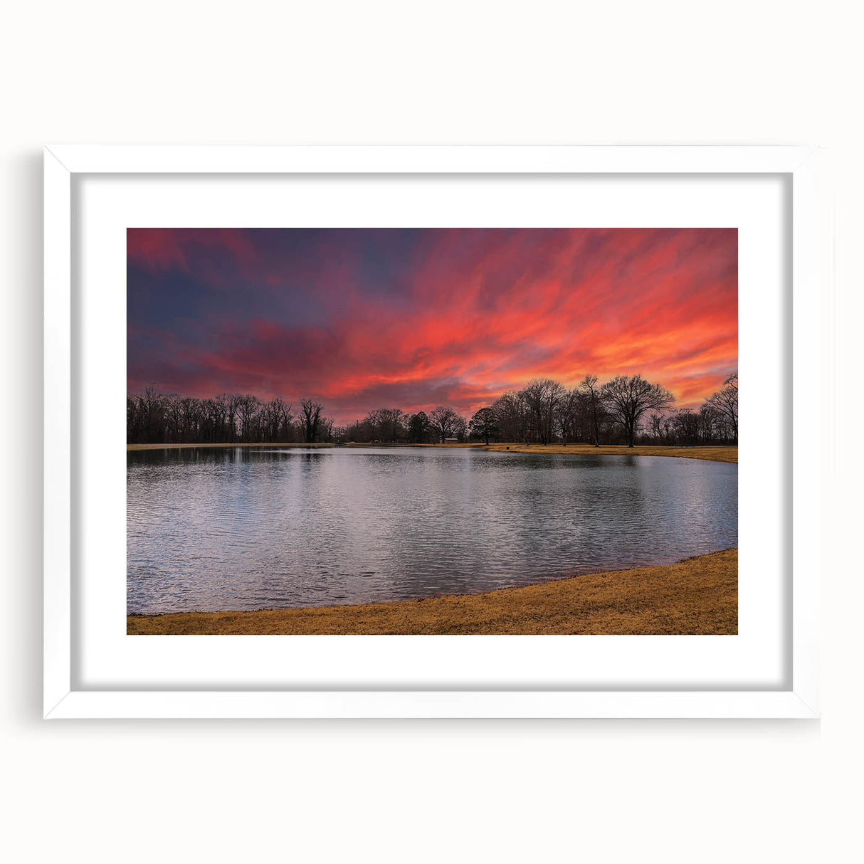 Abstract art print of Memphis scenery in muted earth tones on a framed white mat, ideal for dining room decor.