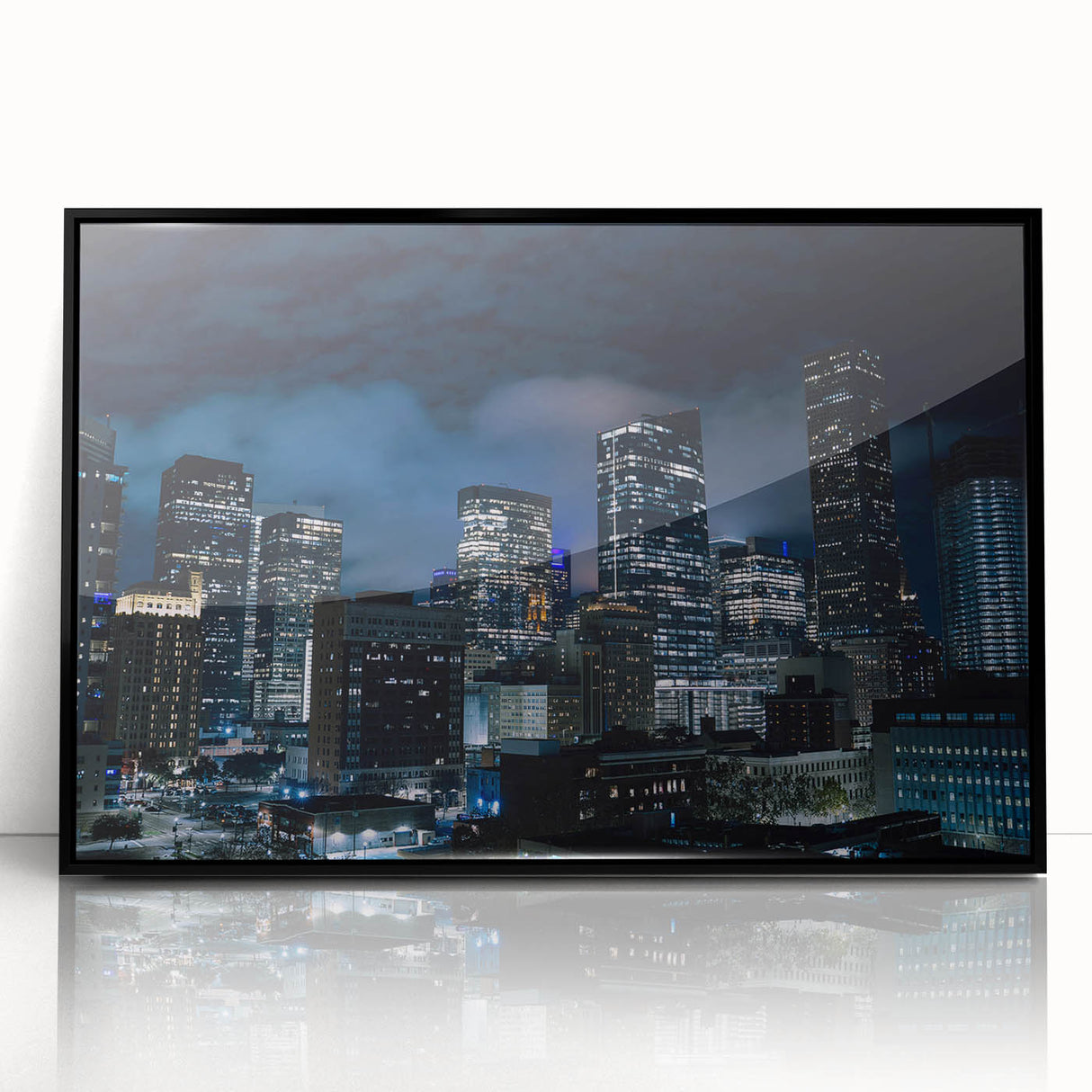 Large abstract wall art of Houston skyline in muted gray and blue tones on framed acrylic.