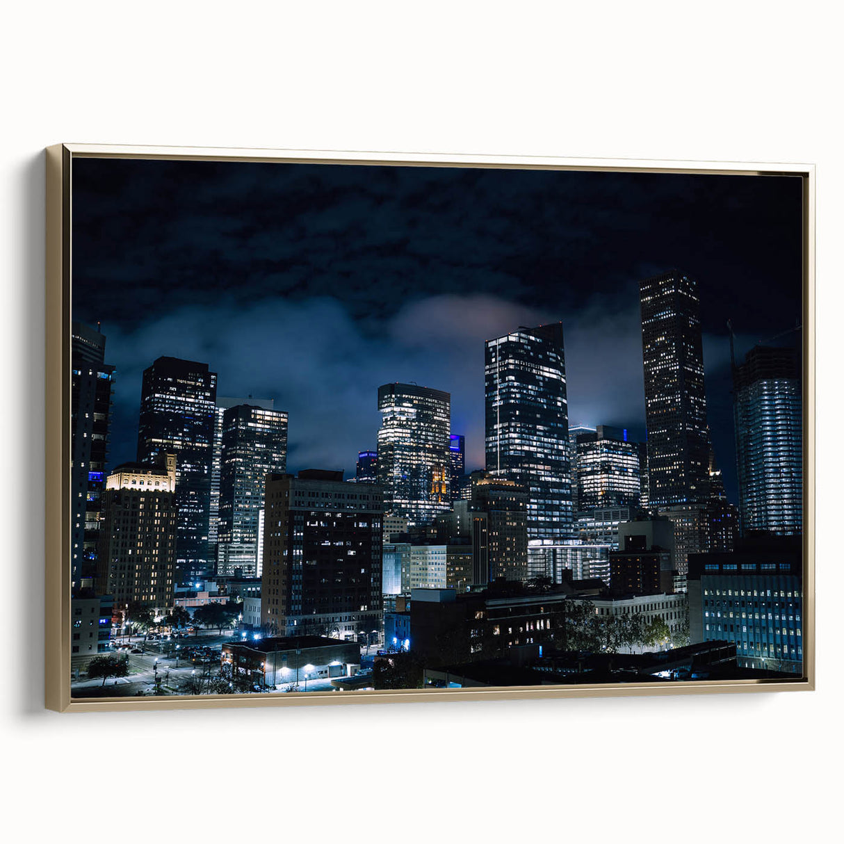 Framed canvas featuring a vintage-style landscape painting of Houston, Texas, with muted gold and black tones.