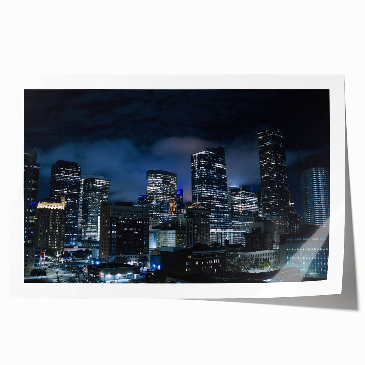 Rolled print of Houston skyline with muted blue and gray tones on canvas, suitable for dining room wall art.