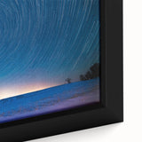 Close-up of extra large framed canvas featuring a textured Vermont scenery in black with colorful art accents.