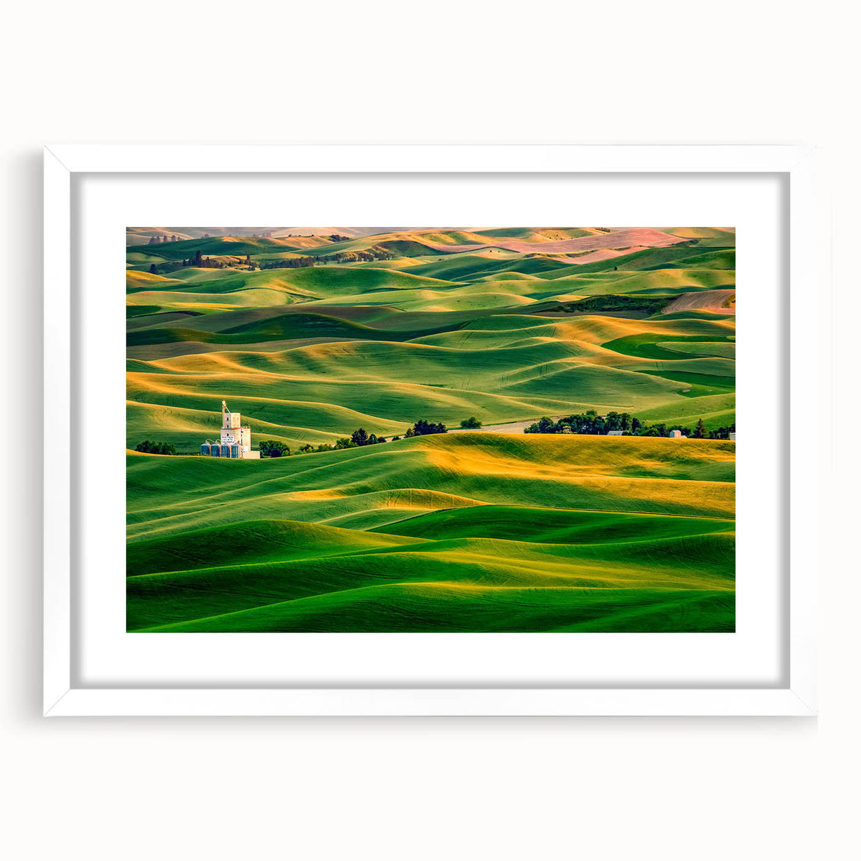 Abstract art print of Palouse hills in muted green and brown on a white framed canvas, suitable for dining room decor.