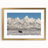 Extra large framed wall art featuring an abstract depiction of the Grand Tetons in textured gold and brown tones.