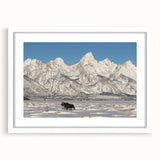 Abstract art print of the Grand Tetons in muted earth tones on a white-framed mat, suitable for bedroom or dining room decor.