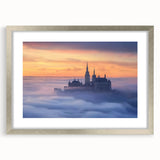 Elegant silver-framed landscape artwork featuring a picturesque castle scene, displayed with a white mat, perfect for enhancing home decor or office ambiance.