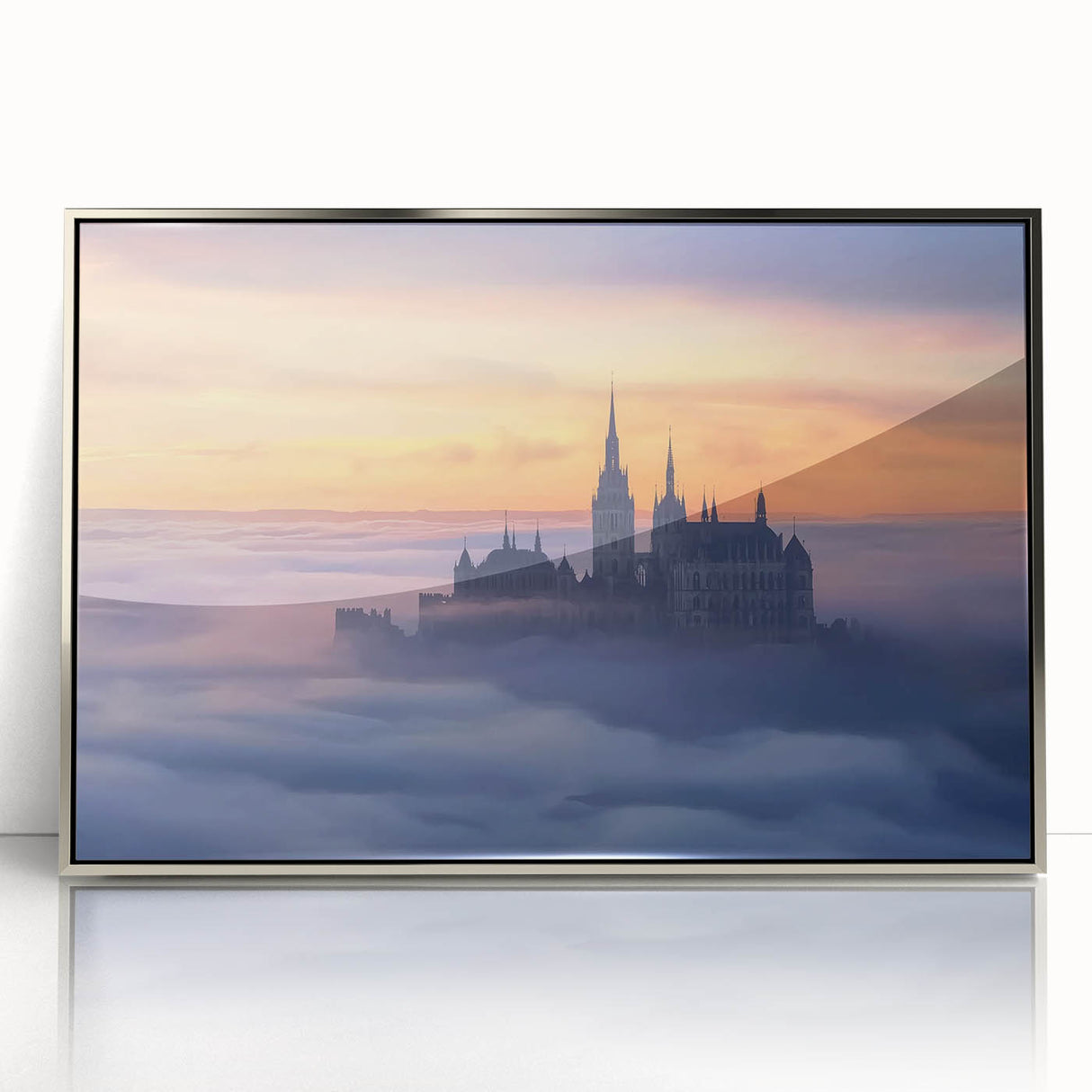 Framed acrylic artwork depicting a majestic castle surrounded by lush landscapes, featuring a sleek silver frame and vibrant colors, perfect for home decor.