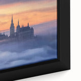 Close-up of a framed landscape canvas depicting a medieval castle surrounded by lush greenery, showcasing vibrant colors and intricate details, ideal for home decor.