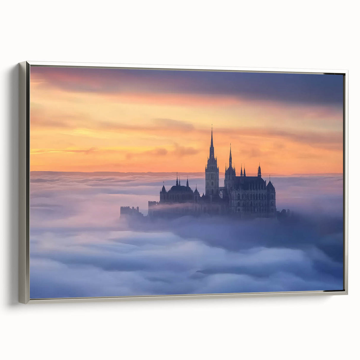 Framed canvas artwork depicting a picturesque landscape with a castle, featuring a silver frame and a side view that highlights its elegant design and colors. Perfect for enhancing home decor.