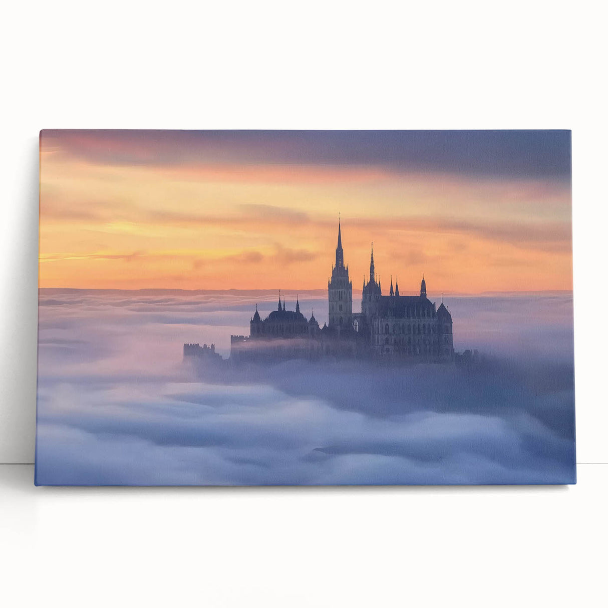 Stretched canvas artwork showcasing a picturesque landscape with a majestic castle surrounded by vibrant greenery and a clear blue sky, perfect for home decor.