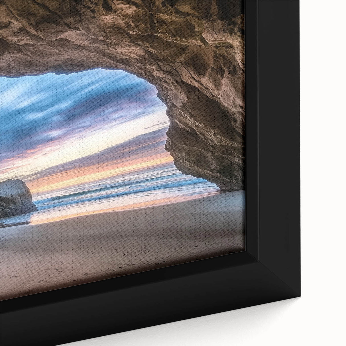 Close-up of a framed canvas artwork depicting intricate cave landscapes, showcasing rich earth tones and detailed textures, perfect for enhancing home decor.