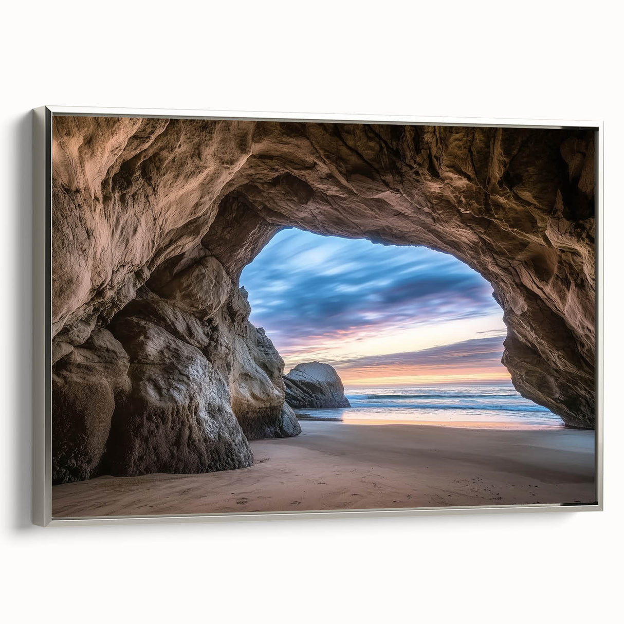 Framed canvas artwork showcasing a stunning landscape with caves, featuring a silver side profile, perfect for home decor and enhancing interior aesthetics.