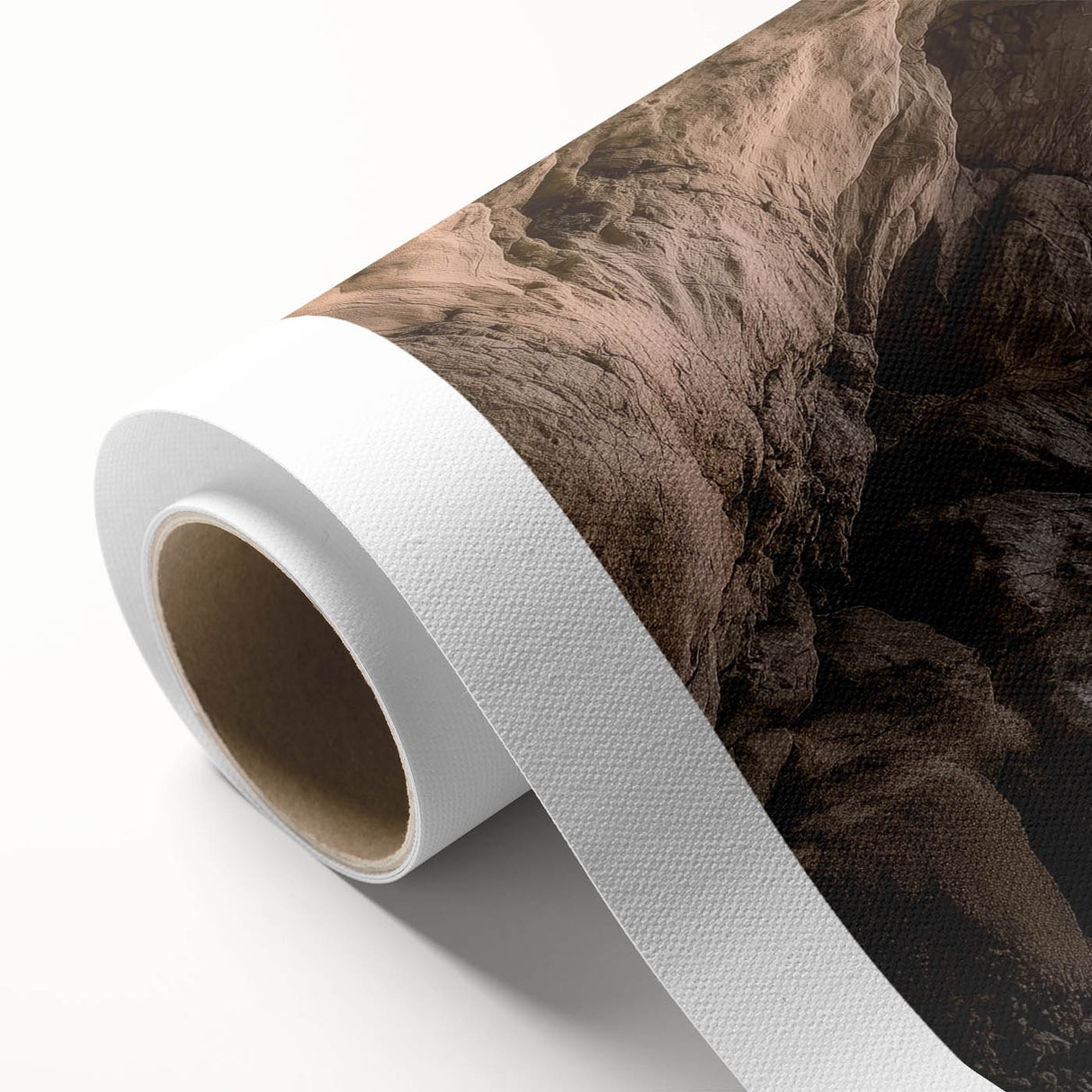 Rolled canvas artwork depicting a vibrant landscape scene with caves, showcasing earthy tones and textures, ideal for home decor or artistic display.